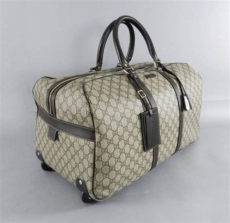 replica duffle bags|gucci rolling duffle bag.